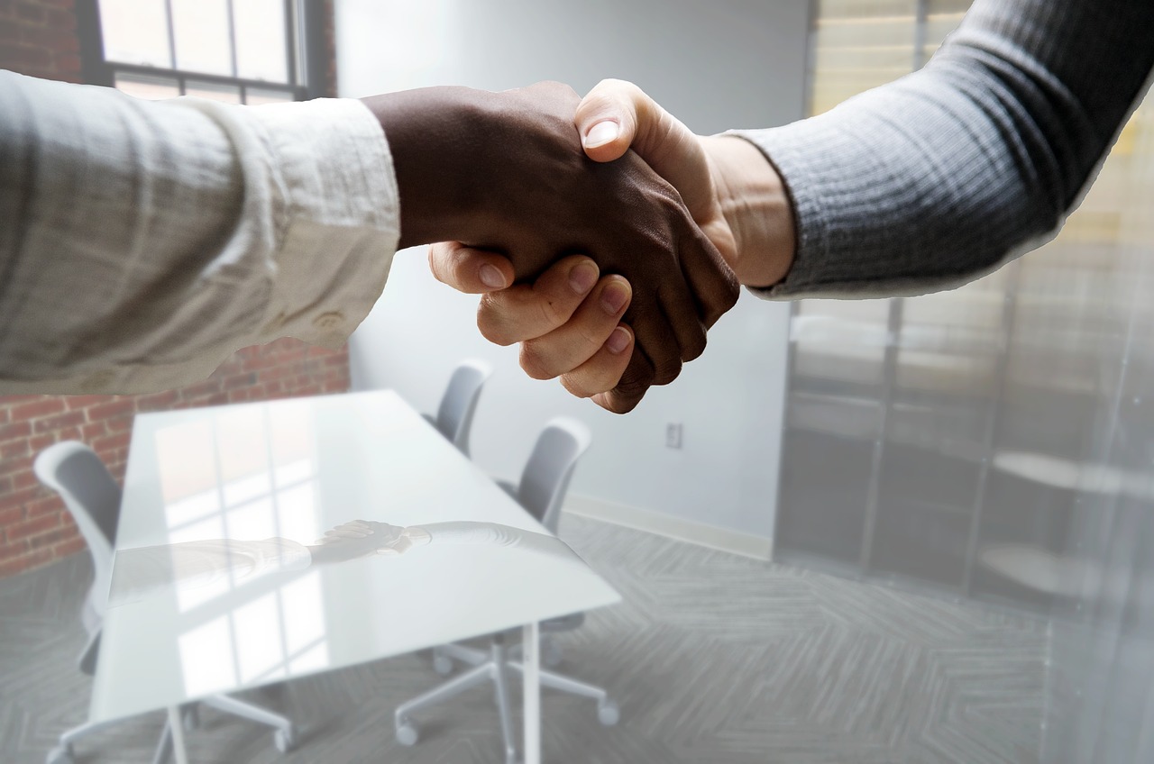 Shaking hands is good communication in interviews